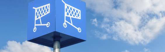 Shopping cart sign in a parking lot of a new shopping mall.